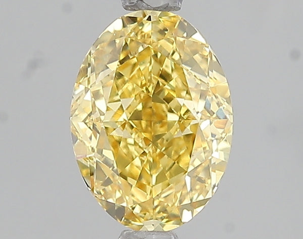 1.6ct Fancy Vivid Yellow Oval Lab Diamond, VVS2, IGI Certified