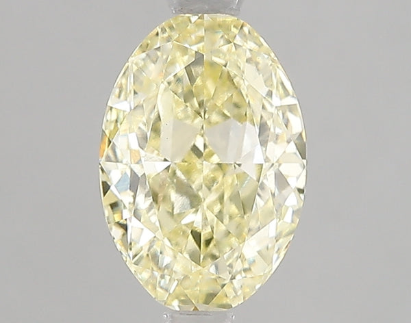 2.01ct Fancy Yellow Oval Lab Diamond, VS1, IGI Certified