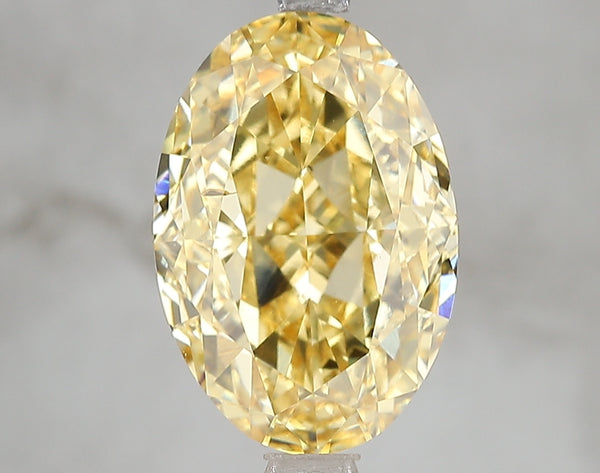 5.04ct Fancy Vivid Yellow Oval Lab Diamond, SI1, IGI Certified