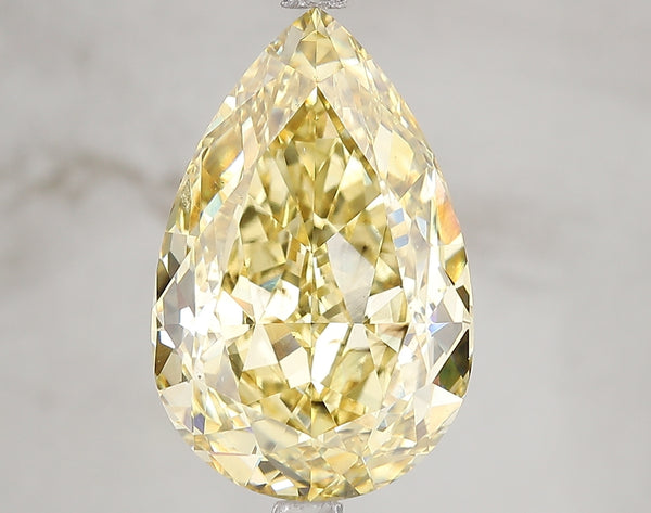 7.05ct Fancy Vivid Yellow Pear Lab Diamond, SI1, IGI Certified