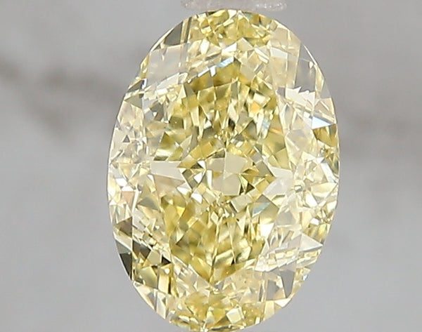 1.6ct Fancy Intense Yellow Oval Lab Diamond, VS1, IGI Certified