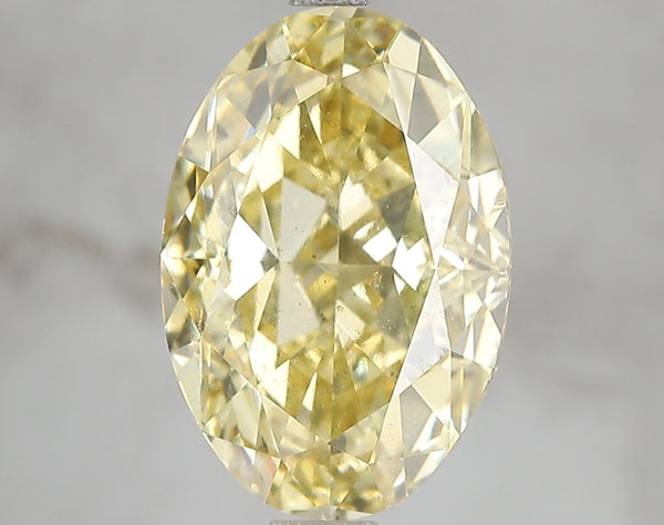 5.05ct Fancy Vivid Yellow Oval Lab Diamond, VS2, IGI Certified