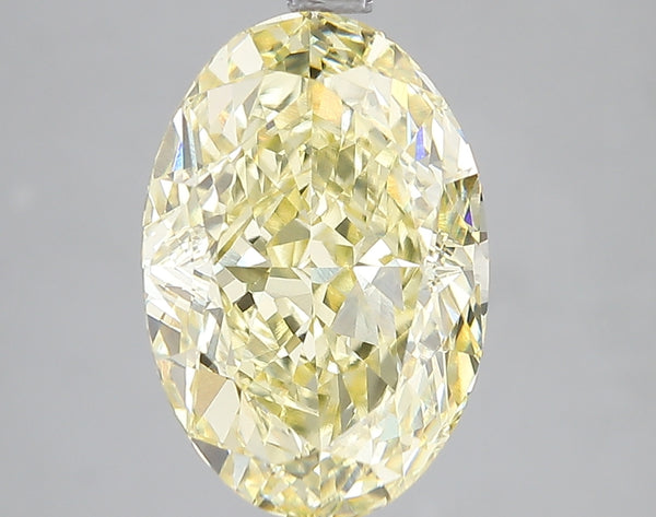 5.07ct Fancy Vivid Yellow Oval Lab Diamond, VS1, IGI Certified