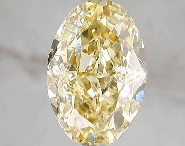 3.03ct Fancy Intense Yellow Oval Lab Diamond, VS2, IGI Certified