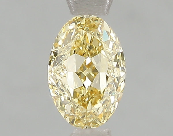 1.02ct Fancy Intense Yellow Oval Lab Diamond, VS2, IGI Certified