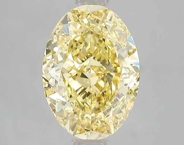 3.01ct Fancy Vivid Yellow Oval Lab Diamond, VS1, IGI Certified