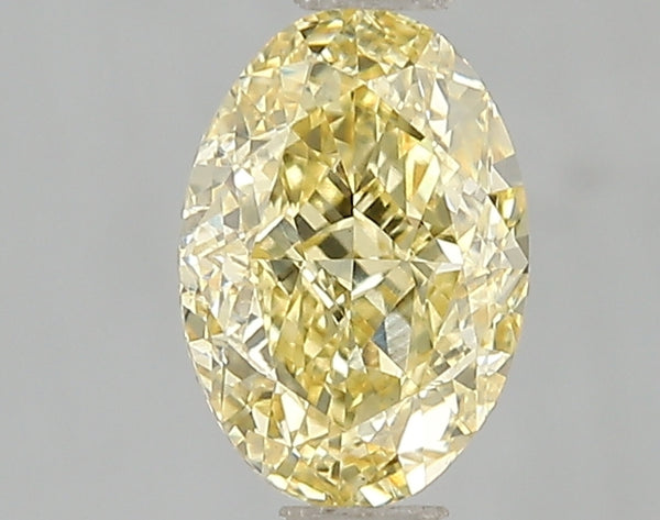 1.51ct Fancy Vivid Yellow Oval Lab Diamond, VS2, IGI Certified