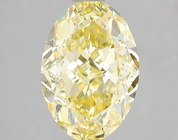 3.1ct Fancy Vivid Yellow Oval Lab Diamond, VVS2, IGI Certified