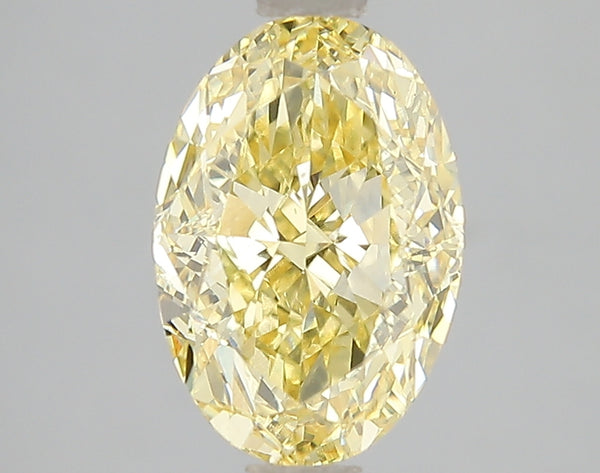 3.01ct Fancy Vivid Yellow Oval Lab Diamond, VS2, IGI Certified