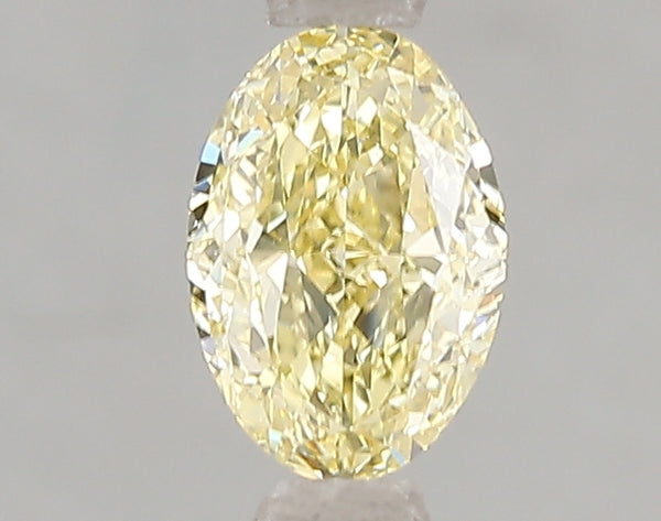 1.06ct Fancy Intense Yellow Oval Lab Diamond, VS2, IGI Certified