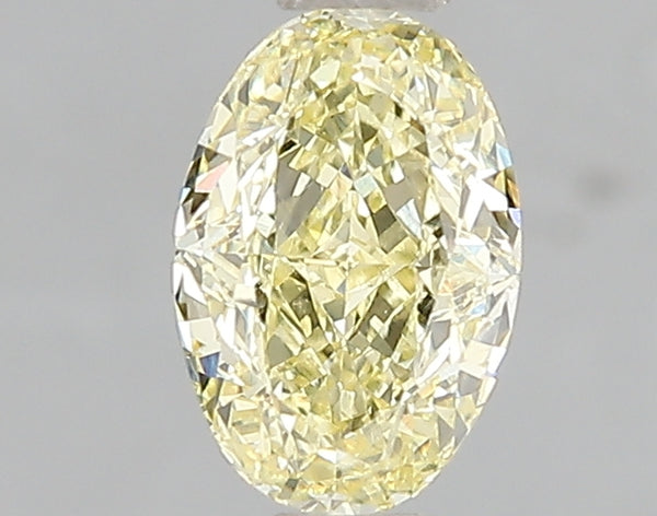 1.09ct Fancy Intense Yellow Oval Lab Diamond, VS1, IGI Certified
