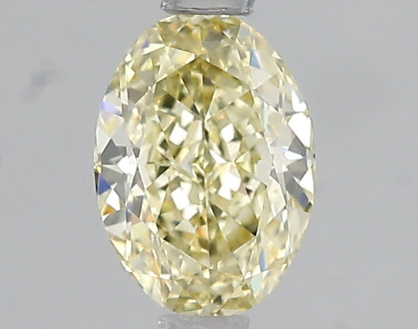1.03ct Fancy Intense Yellow Oval Lab Diamond, VVS2, IGI Certified