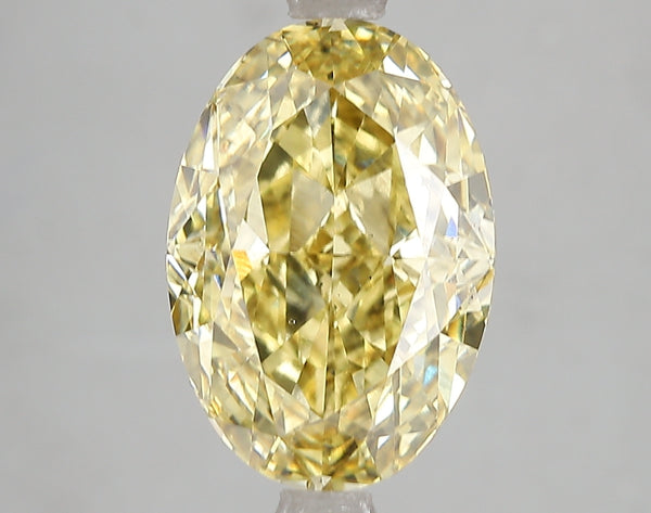 5.08ct Fancy Vivid Yellow Oval Lab Diamond, VS2, IGI Certified
