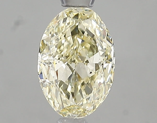 1.01ct Fancy Light Yellow Oval Lab Diamond, VS2, IGI Certified