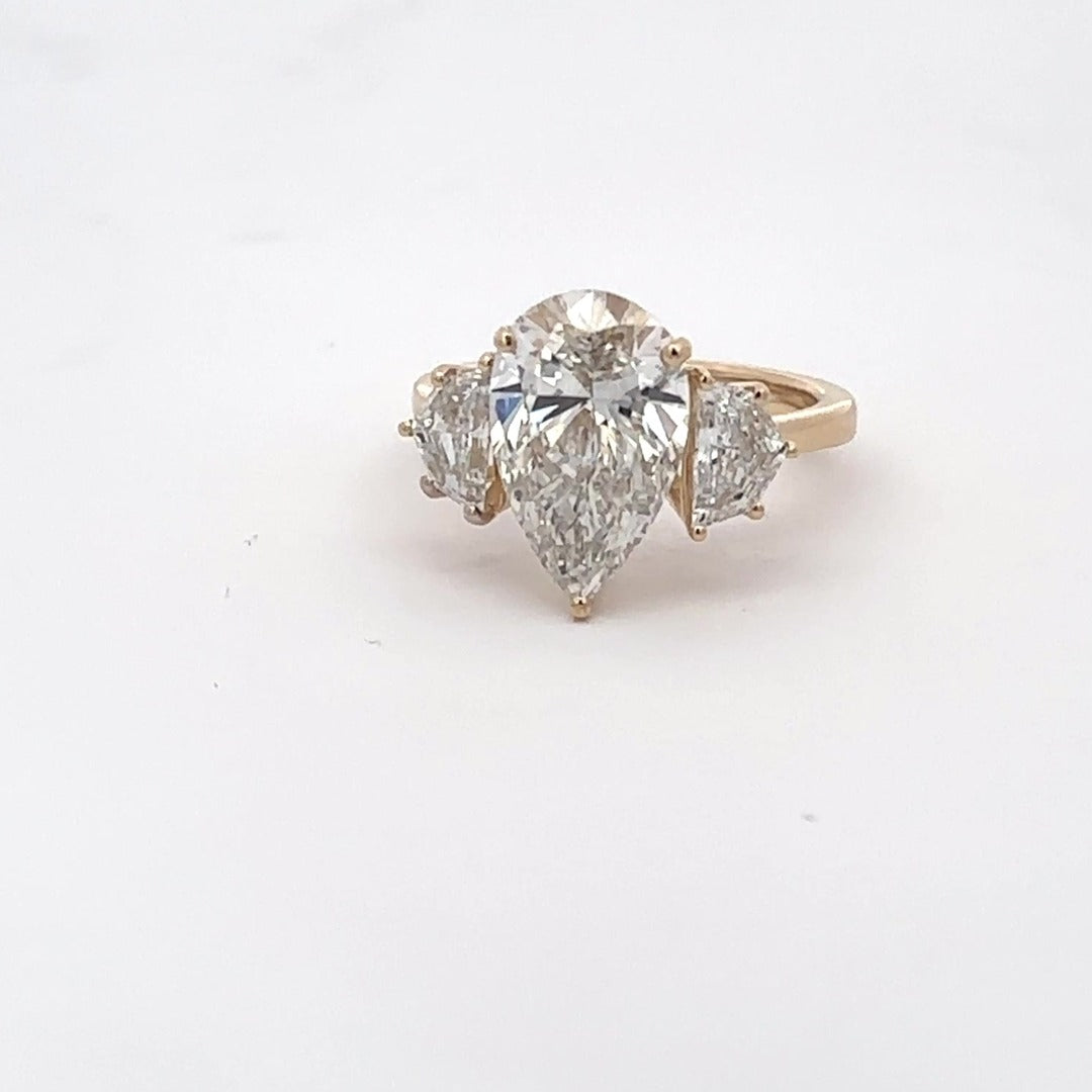 The Delphine Pear Three-Stone Ring