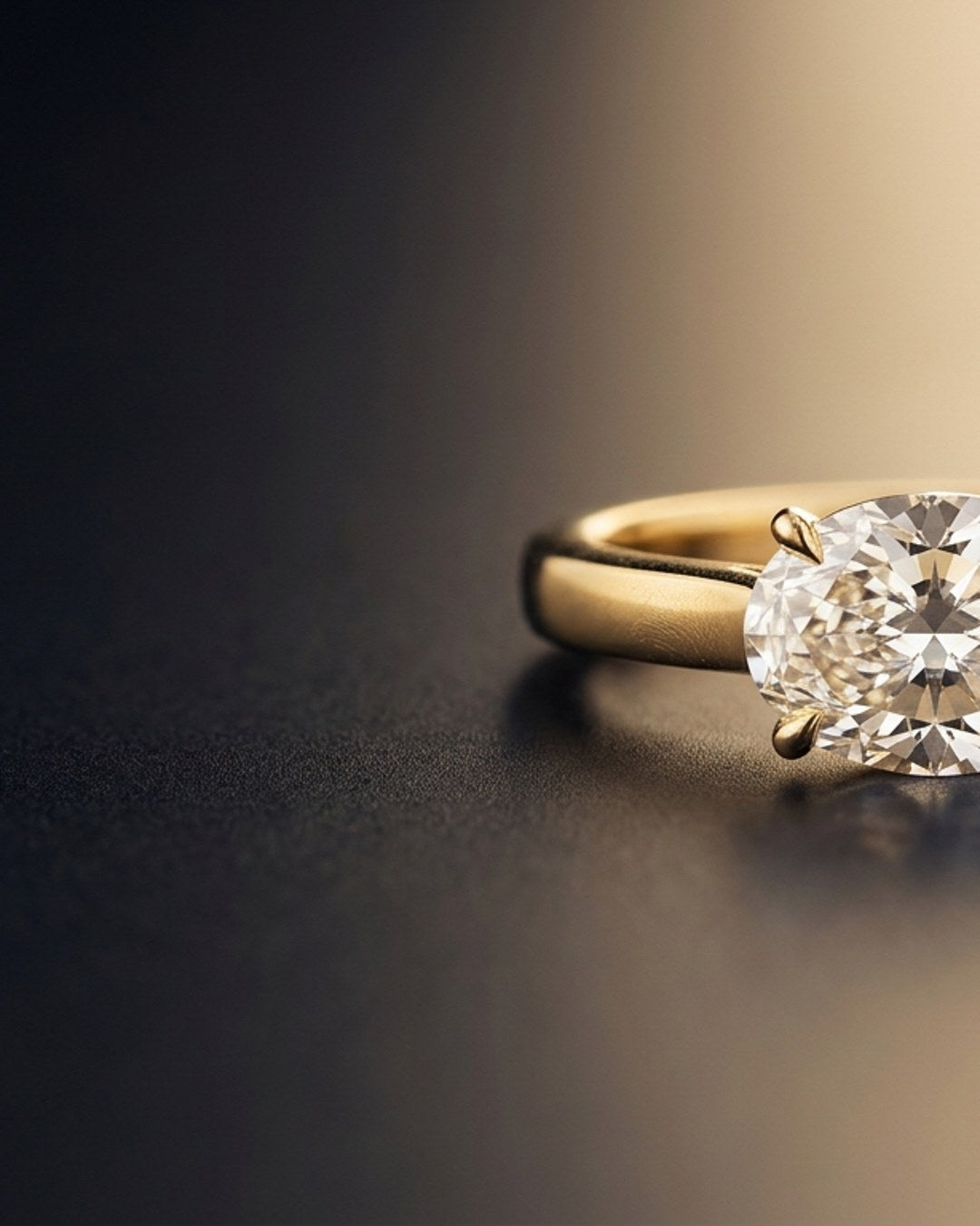 The Lucie East-West Cushion Three-Stone Ring