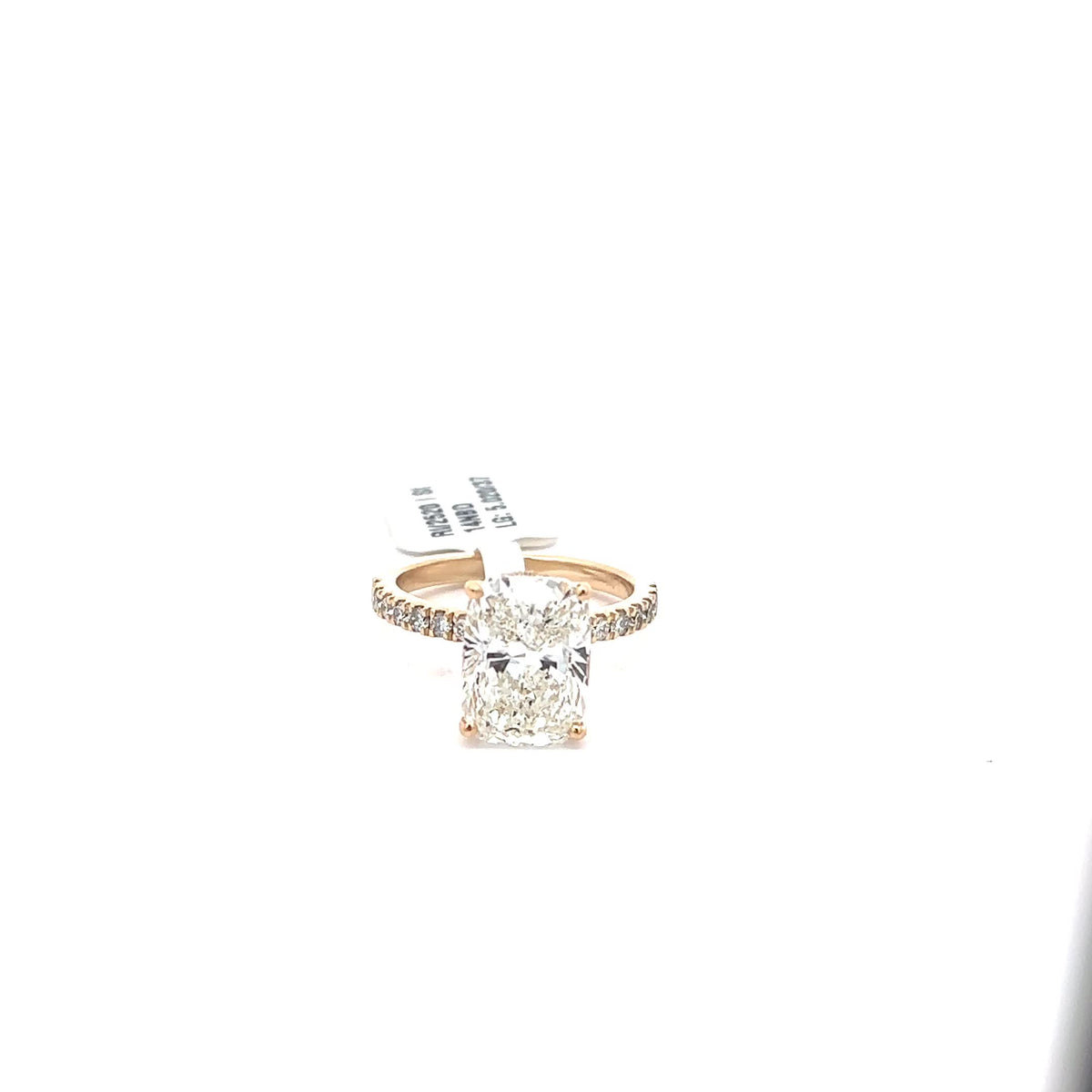 The Coralie elongated cushion hidden-halo solitaire ring in 14K yellow gold