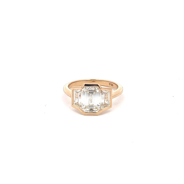 The Eugenie emerald-cut three-stone ring in 18K yellow gold