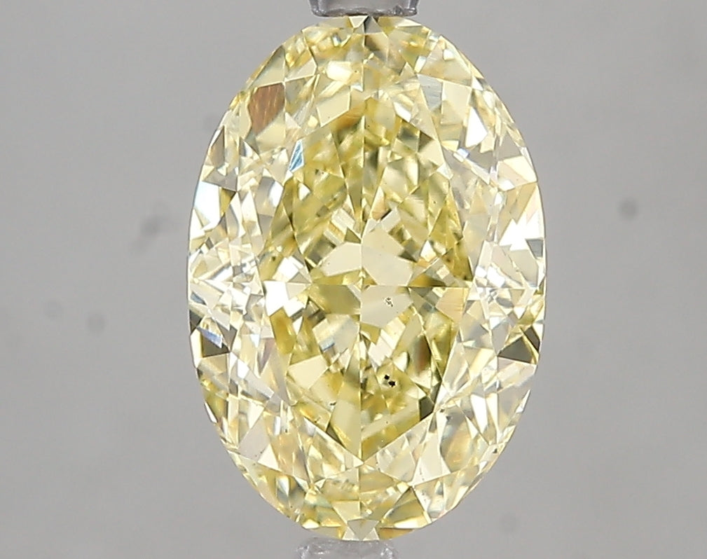 3.01ct Fancy Intense Yellow Oval Lab Diamond, VS2, IGI Certified