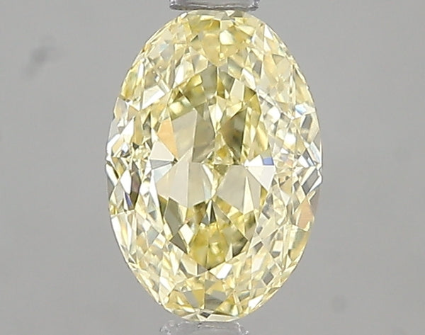 1.05ct Fancy Intense Yellow Oval Lab Diamond, VVS2, IGI Certified