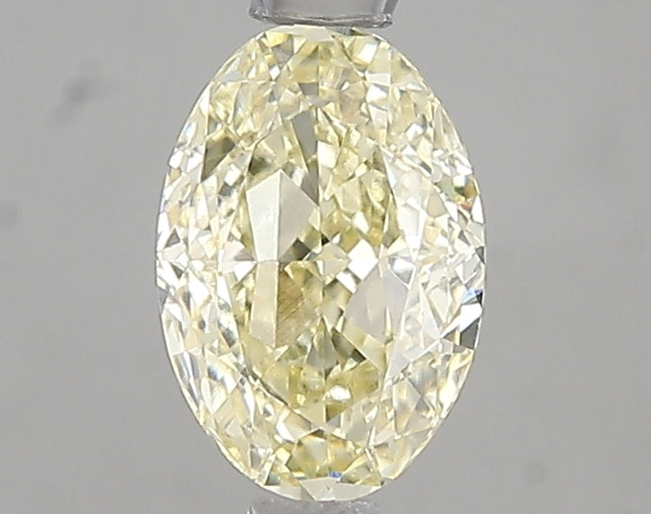1.06ct Fancy Light Yellow Oval Lab Diamond, VVS2, IGI Certified