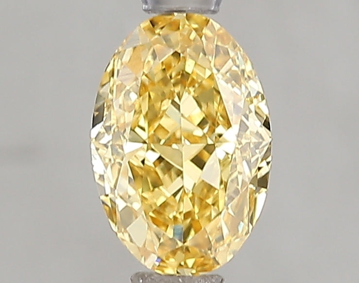 1.08ct Fancy Vivid Yellow Oval Lab Diamond, VVS2, IGI Certified
