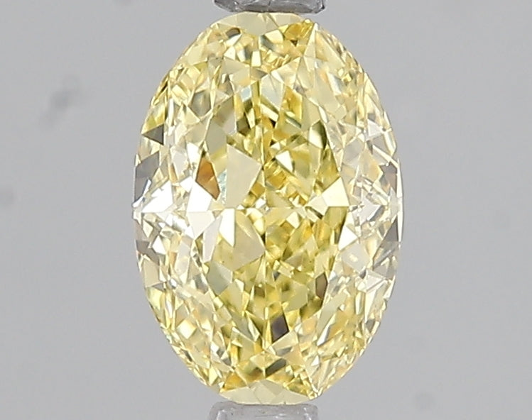1.08ct Fancy Intense Yellow Oval Lab Diamond, VS1, IGI Certified