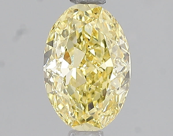 1.08ct Fancy Intense Yellow Oval Lab Diamond, VS1, IGI Certified