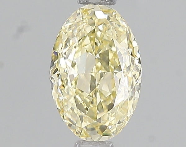 1.01ct Fancy Yellow Oval Lab Diamond, VVS2, IGI Certified
