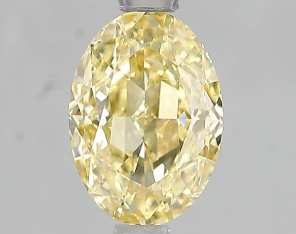 1.56ct Fancy Intense Yellow Oval Lab Diamond, VVS2, IGI Certified