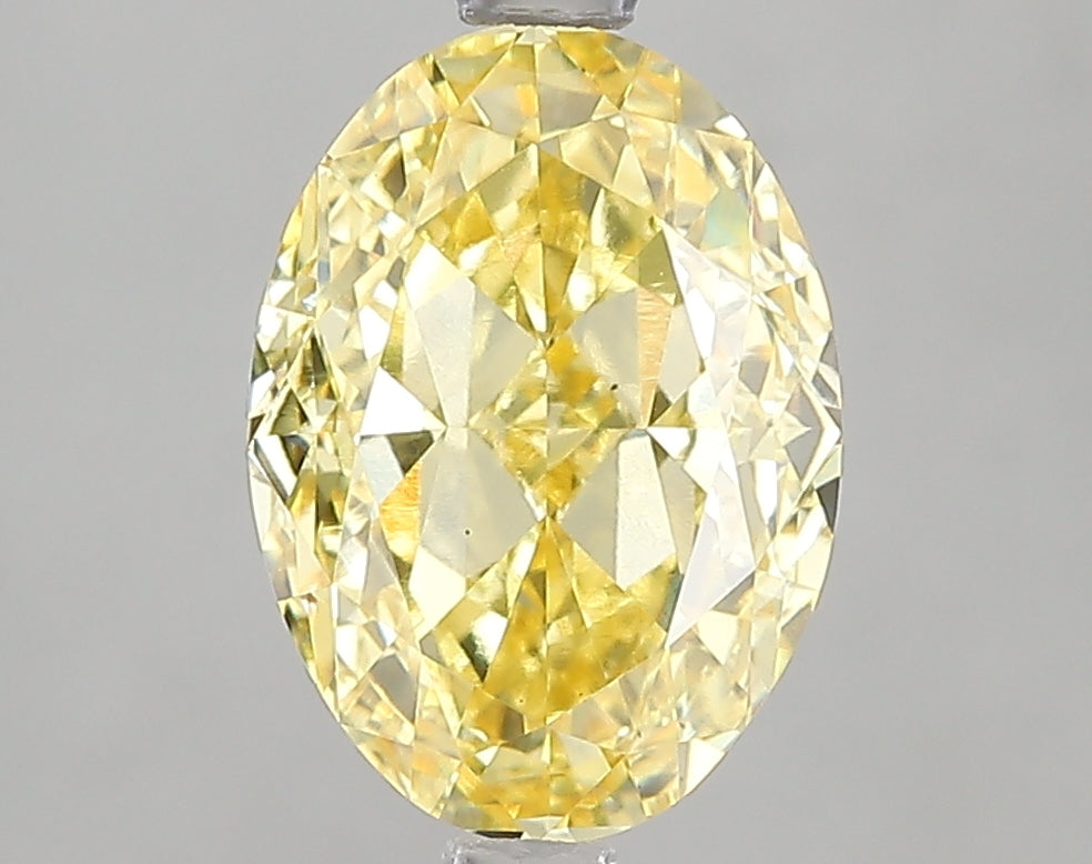 3.03ct Fancy Vivid Yellow Oval Lab Diamond, VS1, IGI Certified