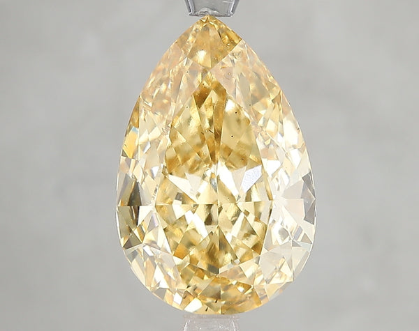 5.02ct Fancy Vivid Yellow Pear Lab Diamond, VS2, IGI Certified