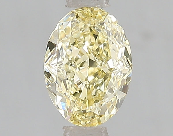 1.01ct Fancy Intense Yellow Oval Lab Diamond, VS2, IGI Certified