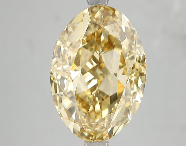 7.1ct Fancy Vivid Yellow Oval Lab Diamond, VVS2, IGI Certified