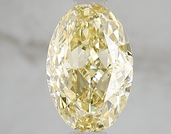 2.1ct Fancy Intense Yellow Oval Lab Diamond, VS2, IGI Certified