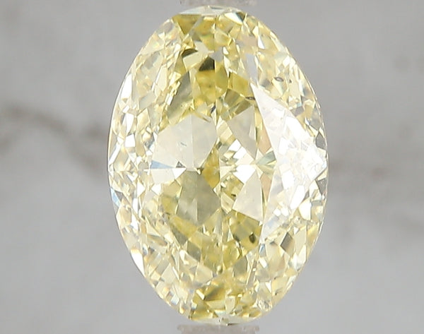 3.01ct Fancy Vivid Yellow Oval Lab Diamond, VS2, IGI Certified