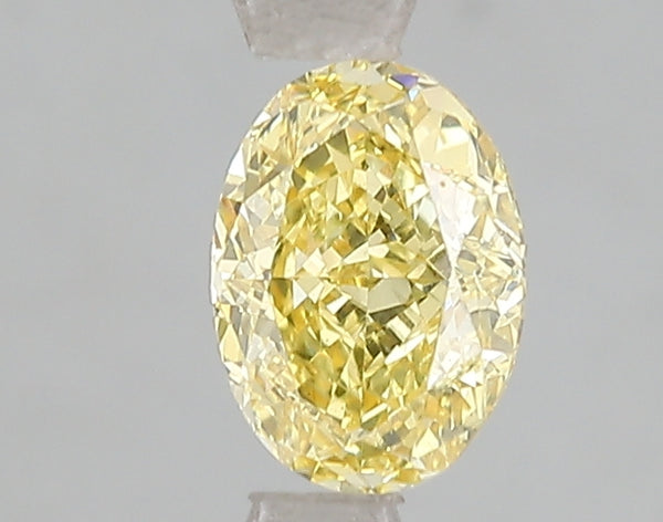 1.07ct Fancy Vivid Yellow Oval Lab Diamond, VS1, IGI Certified