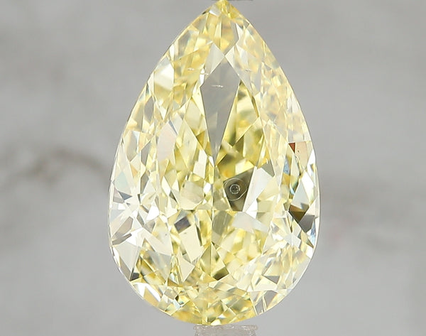 5.02ct Fancy Vivid Yellow Pear Lab Diamond, SI1, IGI Certified