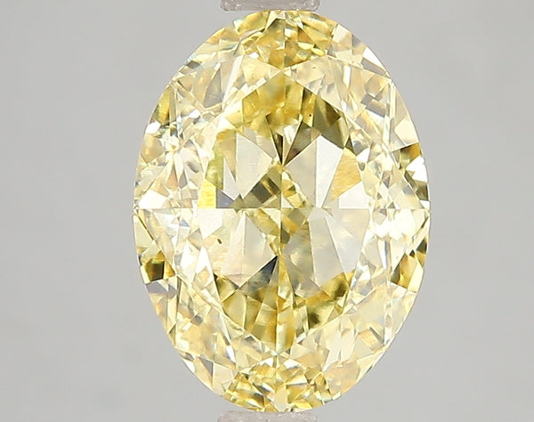 3.1ct Fancy Vivid Yellow Oval Lab Diamond, VS2, IGI Certified