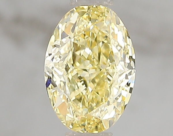 1.1ct Fancy Vivid Yellow Oval Lab Diamond, VVS2, IGI Certified