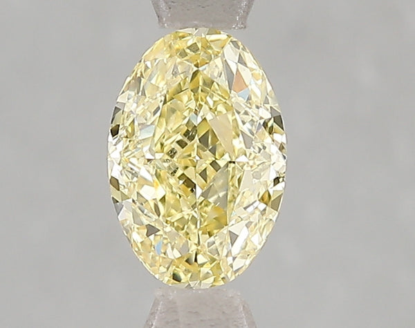 1.02ct Fancy Vivid Yellow Oval Lab Diamond, VS2, IGI Certified