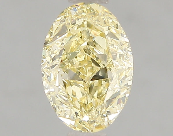 1.52ct Fancy Vivid Yellow Oval Lab Diamond, VS1, IGI Certified