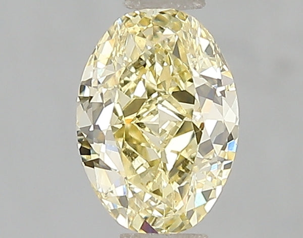 1.03ct Fancy Intense Yellow Oval Lab Diamond, VS1, IGI Certified