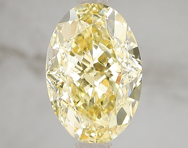 3.07ct Fancy Vivid Yellow Oval Lab Diamond, VS1, IGI Certified