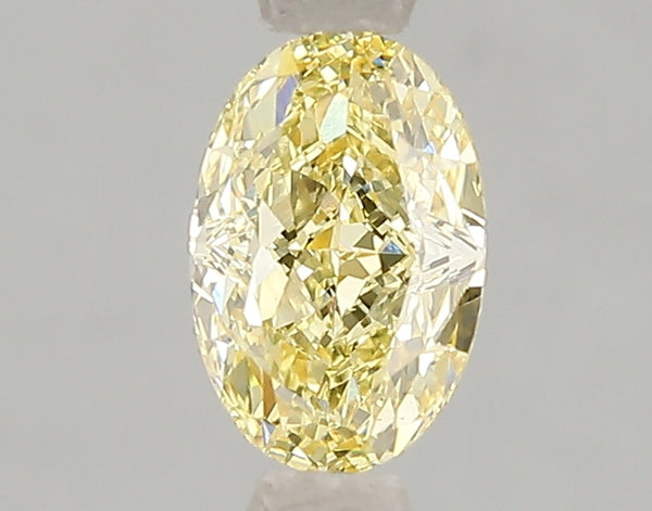 1.08ct Fancy Vivid Yellow Oval Lab Diamond, VS2, IGI Certified