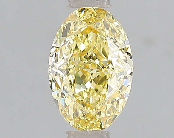 1.05ct Fancy Vivid Yellow Oval Lab Diamond, VS2, IGI Certified