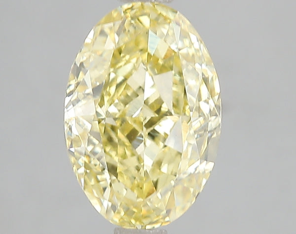 3ct Fancy Vivid Yellow Oval Lab Diamond, VS1, IGI Certified