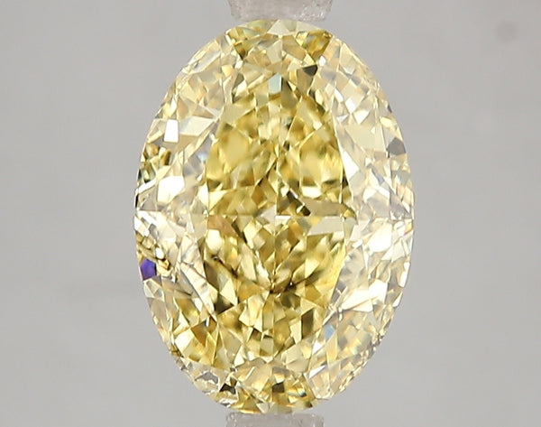 3.02ct Fancy Vivid Yellow Oval Lab Diamond, SI2, IGI Certified