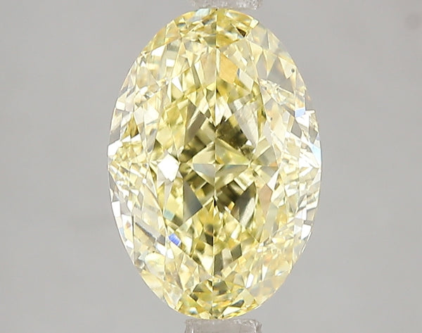 3.06ct Fancy Vivid Yellow Oval Lab Diamond, VS2, IGI Certified