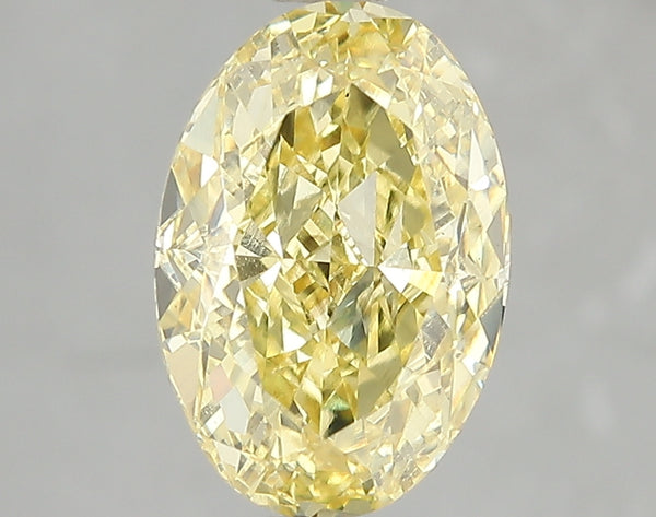 3.06ct Fancy Vivid Yellow Oval Lab Diamond, VS2, IGI Certified